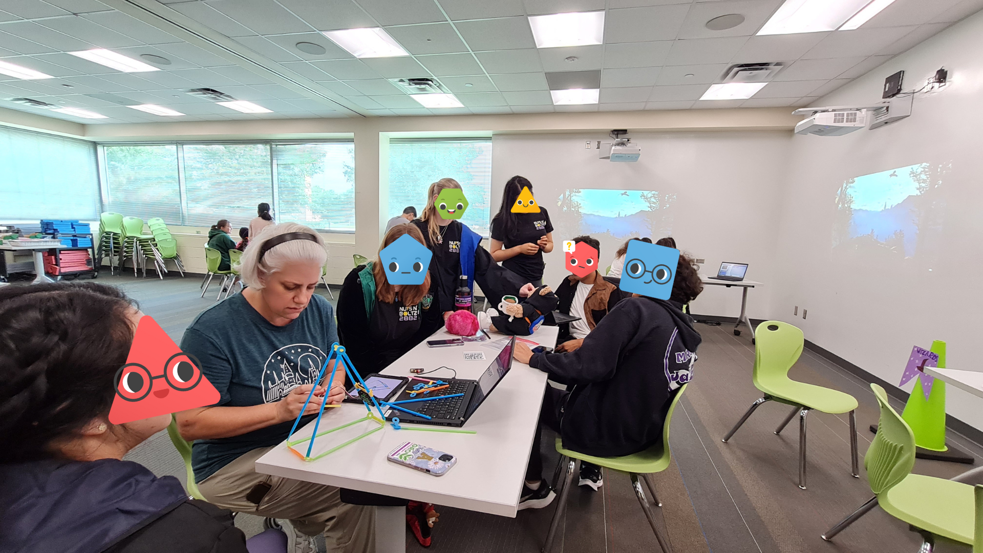 Elizabeth working with kids in the classroom.