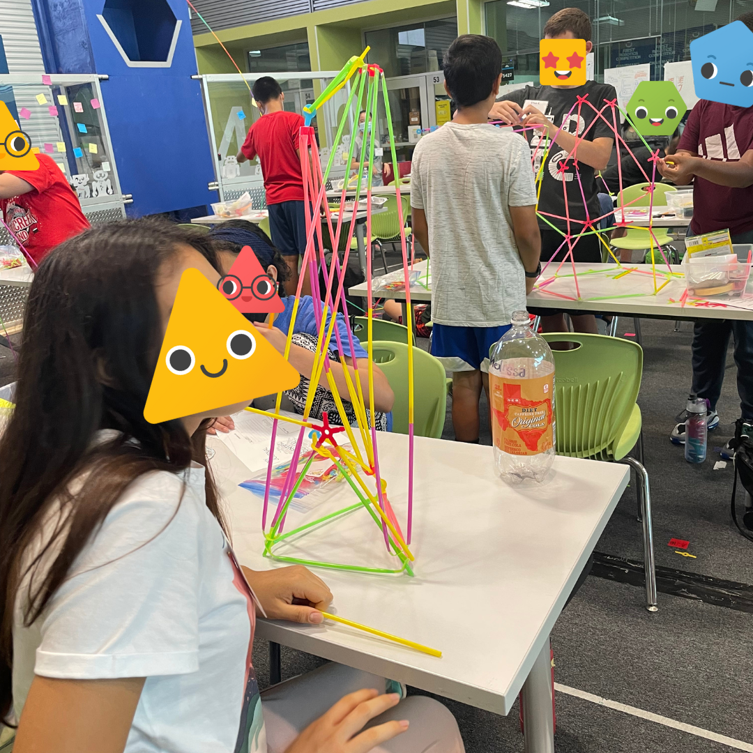 Students working with Strawbees in the classroom.