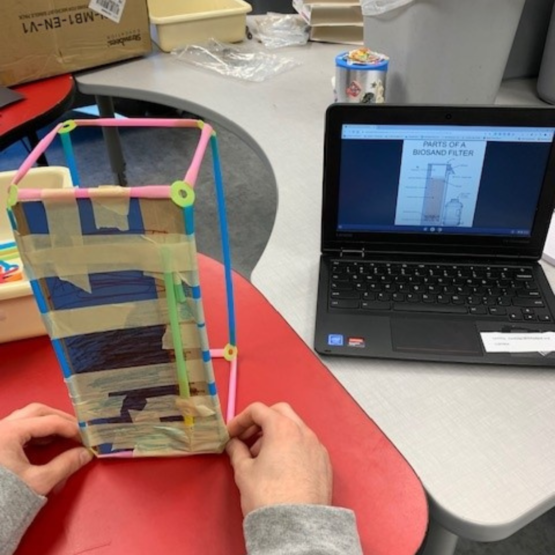 A biosand filter built with Strawbees.