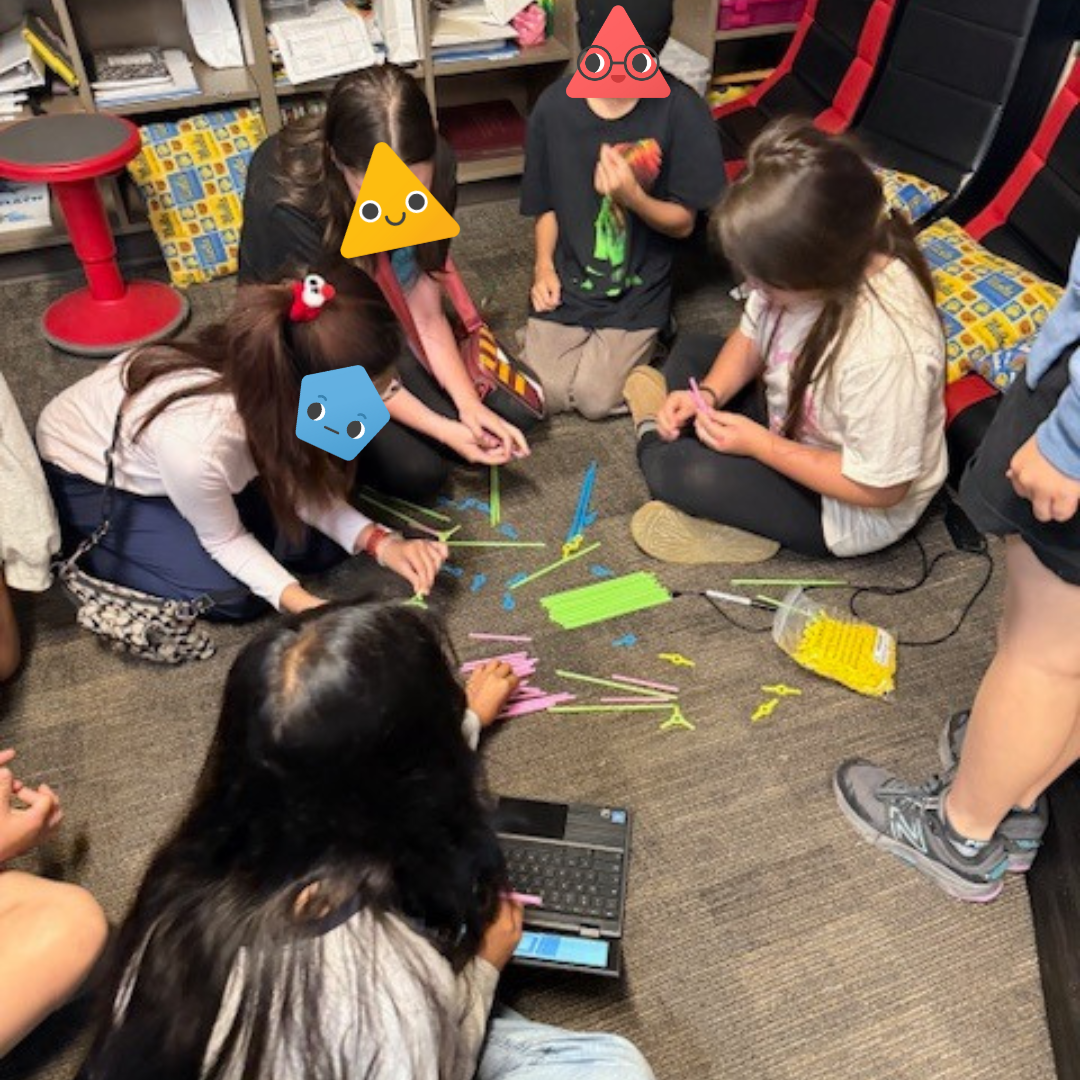 A group of students building and coding with micro:bit.